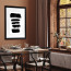 Wissellijst A4 Hout Zwart Breed met print aan muur